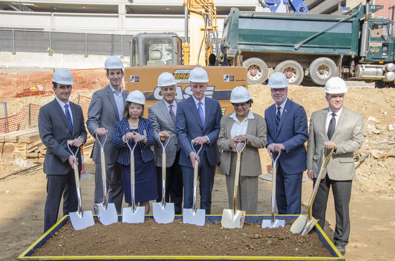 Group photo of groundbreaking for study hotel